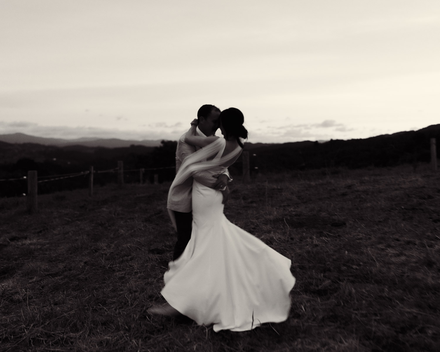 Bride and Groom having a dance at the top of their farm captured by Eilish Burt Photography
