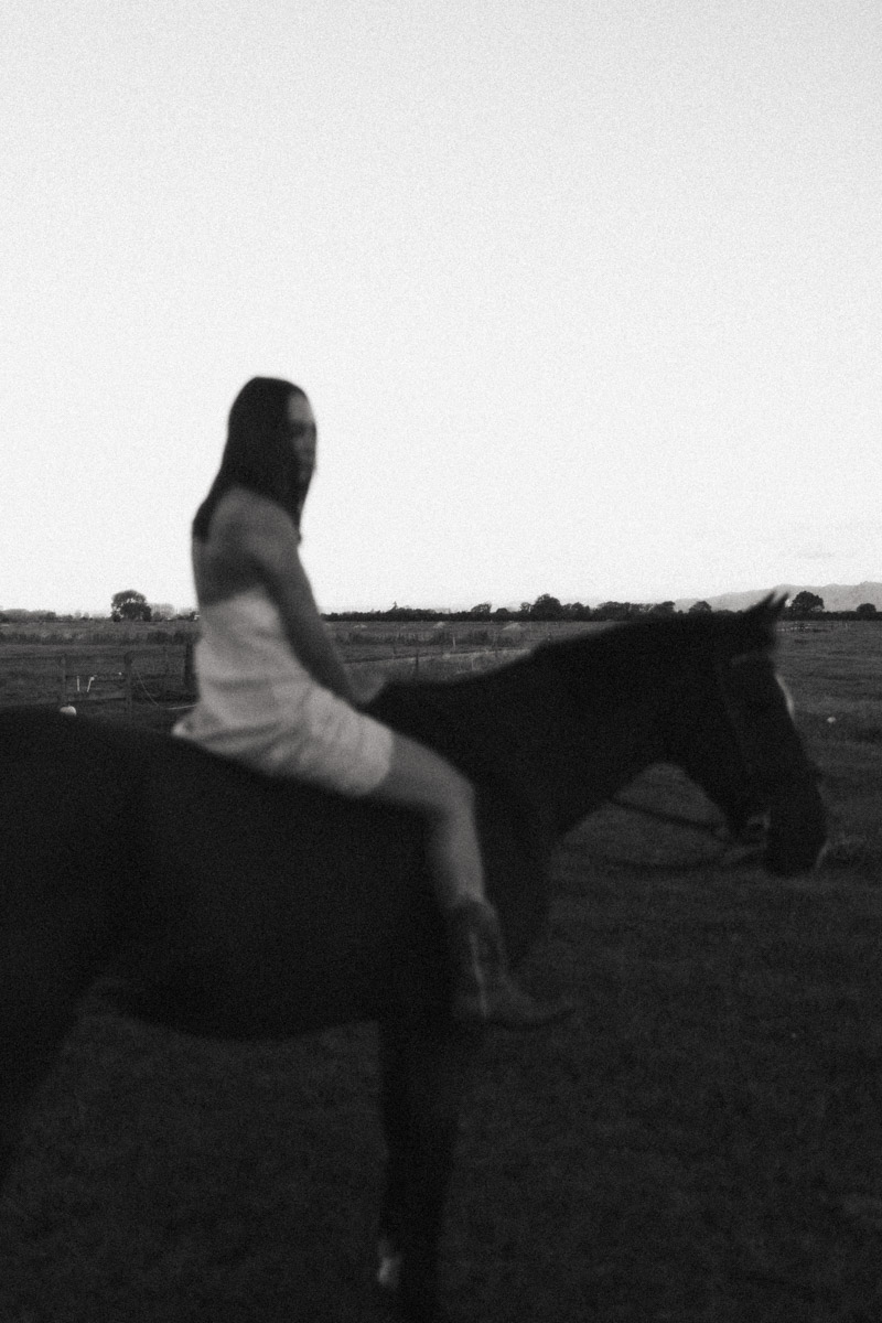 A portrait of a girl riding her horse bareback in Whakatane by Eilish Burt Photography