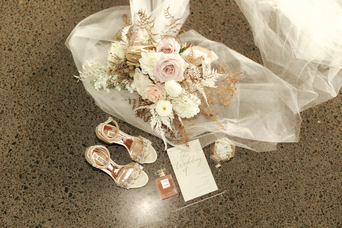brides veil shoes and stationary for her wedding captured by eilish burt photography