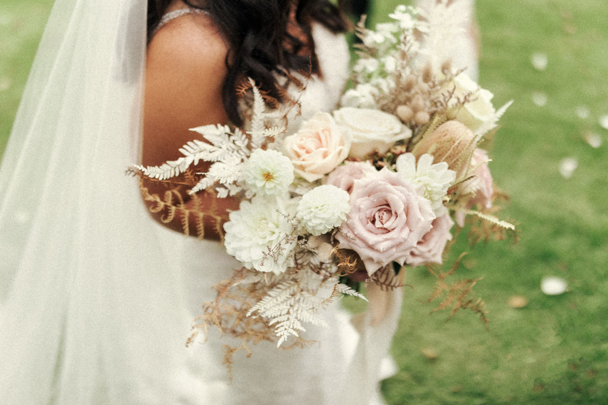 Wedding bouquet of brides floral arrangement at her Wedding in Whakatane by Sweet Stems. Captured by Eilish Burt Photography