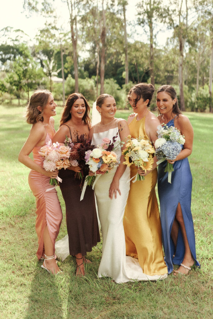 Vintage coloured bridesmaids dresses for a vibrant, Australian Wedding